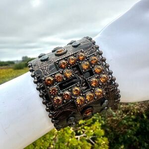 Brown leather orange rhinestone cross snap bracelet